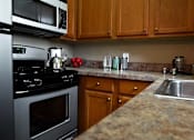 Thumbnail 29 of 66 - Modern kitchen with stainless steel alliances.