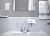 Thumbnail 31 of 66 - Modern bathroom with pedestal sink.