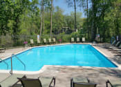 Thumbnail 15 of 16 - Outdoor pool with patio furniture