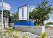 Thumbnail 1 of 14 - The Mason sign is blue and white with a large M on it.