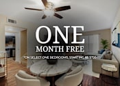 Thumbnail 1 of 19 - A room with a dining table and chairs and a ceiling fan with a text overlay that says "ONE MONTH FREE *ON SELECT ONE BEDROOMS, STARTING AT $799".