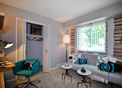 Thumbnail 44 of 47 - a living room with a couch and a window at Village Club of Rochester Hills, Shelby Township, MI