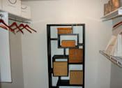 Thumbnail 37 of 47 - a closet with baskets and a shelving unit in it at Village Club of Rochester Hills, Michigan