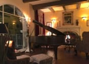 Thumbnail 19 of 35 - Alto Nido Lobby with piano