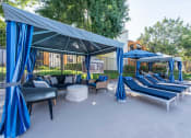Thumbnail 5 of 37 - Resort style cabanas and lounge chairs