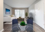 Thumbnail 18 of 37 - Virtual staged furnished dining room and living room