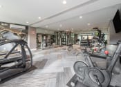 Thumbnail 2 of 37 - Fitness center with cardio equipment