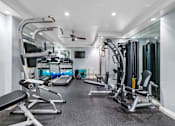 Thumbnail 4 of 14 - the gym at the enclave at woodbridge apartments in sugar land, tx