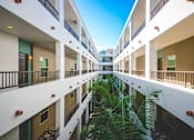 Thumbnail 43 of 49 - Long Corridor With Balconies at Oasis at Lake Encino Apartments, California, 91316