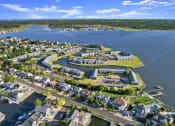 Thumbnail 1 of 35 - an aerial view of a residential neighborhood near a body of water and a lake