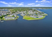 Thumbnail 31 of 35 - an aerial view of a city on a body of water
