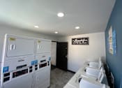 Thumbnail 9 of 19 - a kitchen with white appliances and a counter top
