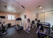 Thumbnail 9 of 35 - the gym at the whispering winds apartments in pearland, tx