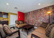 Thumbnail 6 of 35 - a living room with couches and chairs