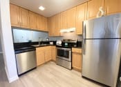 Thumbnail 7 of 11 - Kitchen with stainless steal appliances