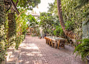 Thumbnail 2 of 27 - Villa Valentino Long Table in courtyard
