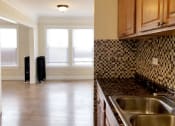 Thumbnail 30 of 38 - a kitchen with a sink and a window