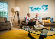 Thumbnail 2 of 59 - Couple On Couch at The Dorchester & Manor, Pineville, North Carolina