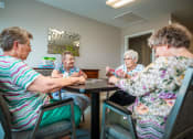 Thumbnail 19 of 59 - Adults Playing Cards at The Dorchester & Manor, Pineville