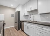 Thumbnail 5 of 67 - Modern Kitchen Appliances at Los Robles Apartments, Pasadena, California