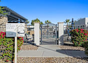 Thumbnail 30 of 36 - The gate of a self-guided tours sign is open.
