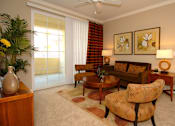 Thumbnail 64 of 80 - Livingroom with couch, coffeetable, chairs and large windows