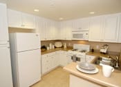 Thumbnail 61 of 80 - Kitchen with white cabinets