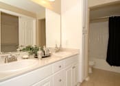 Thumbnail 60 of 80 - Double vanities in bathroom with large mirror