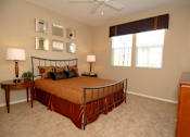 Thumbnail 65 of 80 - Bedroom with windows, nightstand