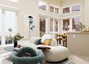 Thumbnail 40 of 117 - A living room with a white couch and a green chair at Skyview Sunset Apartments, Los Angeles