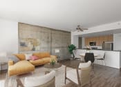 Thumbnail 10 of 44 - Living room with concrete accent wall and kitchen at Vendome Place, San Jose, CA 95110
