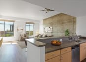 Thumbnail 6 of 44 - Kitchen overlooking living room with large windows at Vendome Place, California