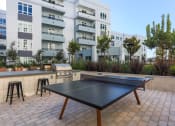 Thumbnail 19 of 33 - enjoy a game of ping pong on our patio
