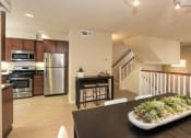 Thumbnail 29 of 46 - a view of the kitchen and dining area from the living room