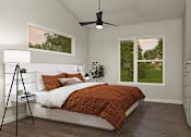 Thumbnail 10 of 11 - a bedroom with a bed and a ceiling fan