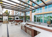 Thumbnail 80 of 127 - Outdoor Kitchen at Casa Estilo Apartments, Chula Vista, California