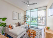 Thumbnail 58 of 127 - Main Living Room at Casa Estilo Apartments, Chula Vista, California