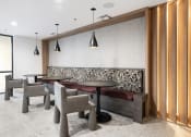 Thumbnail 34 of 39 - Clubroom with seating and tables at Vera Cortez Hill, San Diego