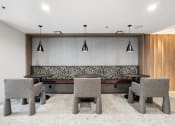 Thumbnail 33 of 39 - Clubroom with seating and tables at Vera Cortez Hill, San Diego, 92101