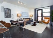 Thumbnail 10 of 51 - Living Room With Windows Leading To Balcony With City Views at Venue, San Francisco, California