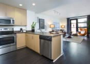 Thumbnail 11 of 51 - Kitchen with stainless steel appliances at Venue, San Francisco, CA