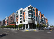 Thumbnail 7 of 51 - Street Corner View Of Exterior Of Complex Lined With Trees at Venue, San Francisco, 94158