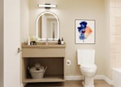 Thumbnail 49 of 117 - A bathroom with a toilet, sink, and tub at Skyview Sunset Apartments, Los Angeles, California