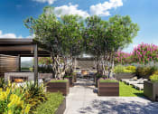 Thumbnail 43 of 83 - bayswater rooftop garden with lush tree and lounge trees at Bayswater Apartments, Burlingame, CA