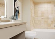 Thumbnail 39 of 117 - A bathroom with a toilet, sink, and a painting on the wall at Skyview Sunset Apartments, Los Angeles 90046