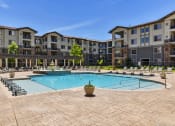Thumbnail 5 of 39 - resort style pool with views at Terracina, Colorado