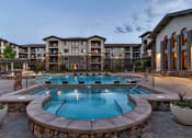 Thumbnail 11 of 39 - hot tub and pool at sunset at Terracina, Broomfield, CO