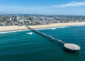 Thumbnail 53 of 75 - a view of the pier from the air with the beach and city in the background