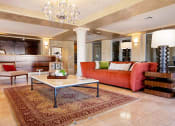 Thumbnail 7 of 75 - Lobby filled with furniture and a chandelier