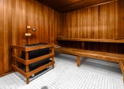 Thumbnail 36 of 75 - a game room with two benches and a table